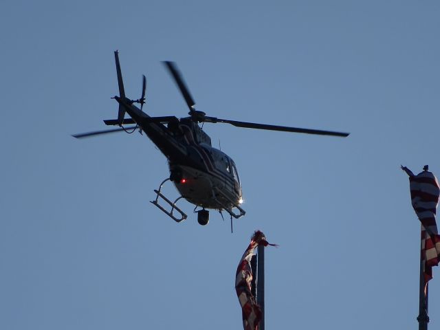 N6987A — - This helicopter was flying over Detroit, Michigan on June 26, 2017. I was standing on the Central (Miller) Parking Garage when shooting this picture.