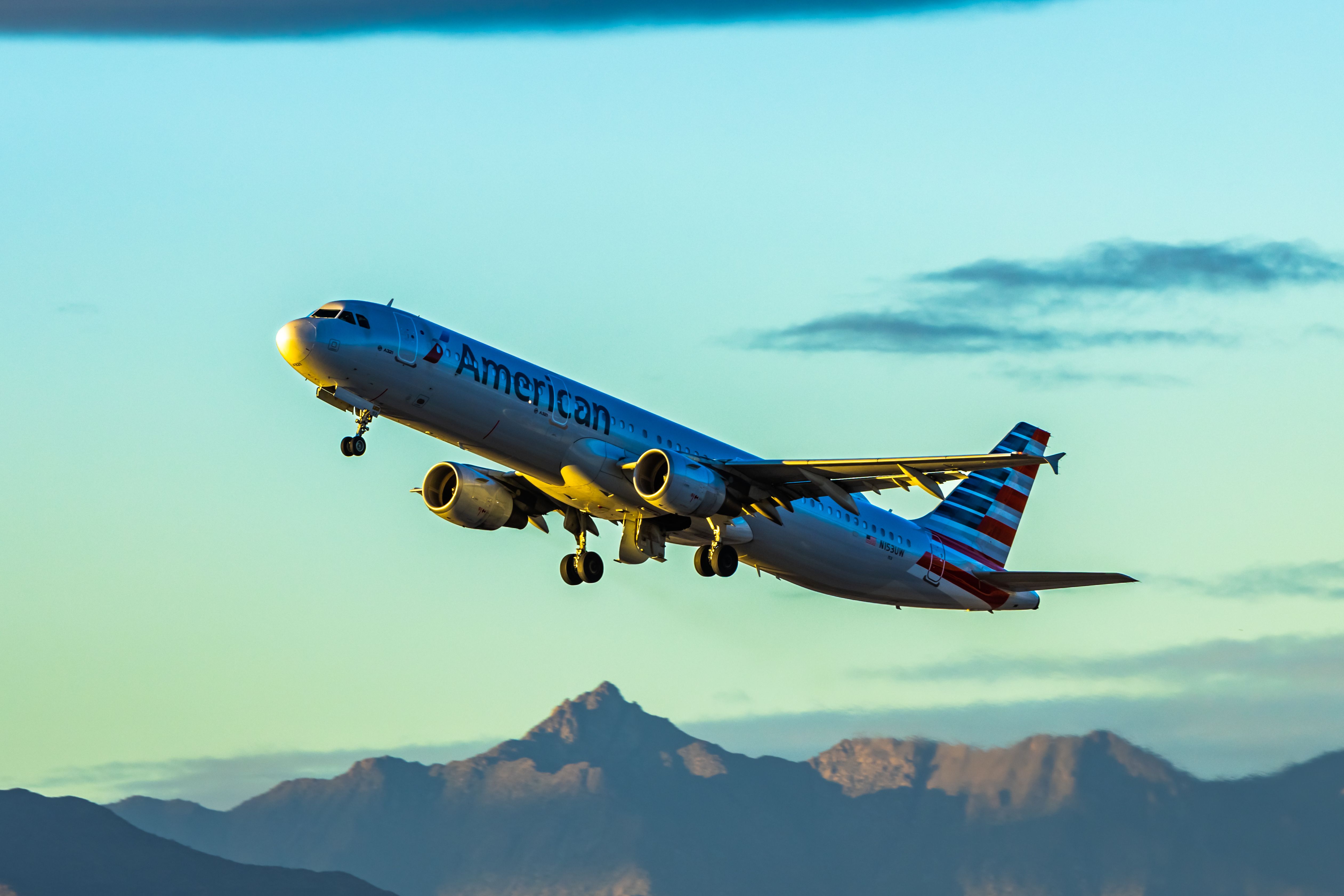 Airbus A321 (N153UW) - American Airlines A321 taking off from PHX on 11/9/22. Taken with a Canon R7 and Tamron 70-200 G2 lens.