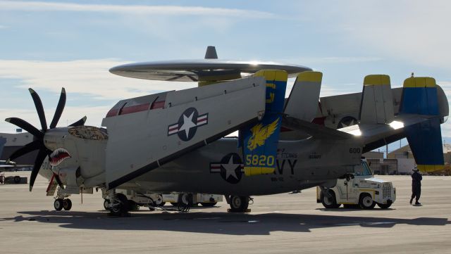 Grumman E-2 Hawkeye (16-5820) - This first FA gallery photo of 165820 is a departure from the routine shot of a Hawkeye showing this unique view of the VAW-112 "Golden Hawks" CAG bird with wings folded back as it basks under a Nevada noontime sun on the ramp at NAS Fallon. VAW-112s home port is NAS Pt. Mugu; when at sea, the "Golden Hawks" fly from the USS John C. Stennis (CVN-74). 