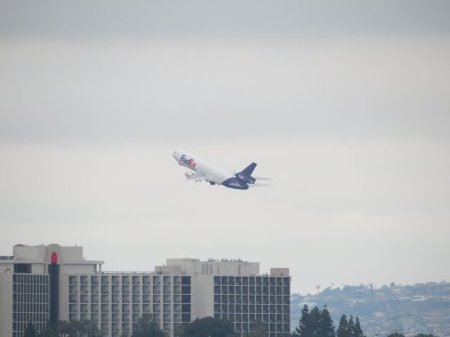 McDonnell Douglas DC-10 — - Taking off over the Sheraton from SAN in the morning.