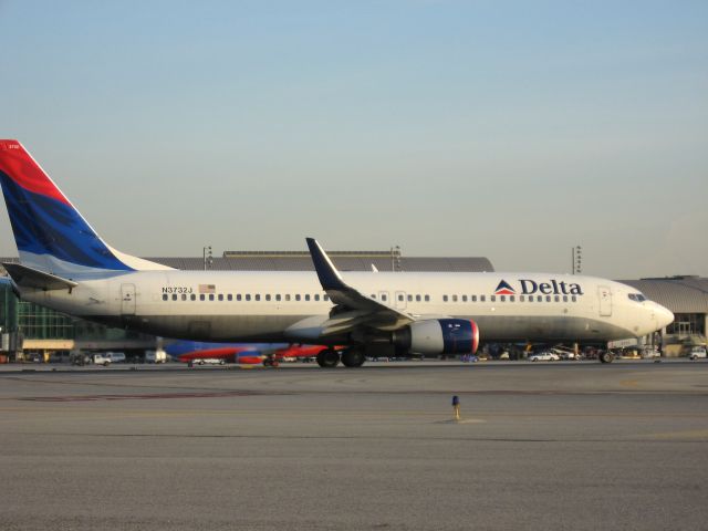 Boeing 737-800 (N3732J) - Holding on RWY 19R