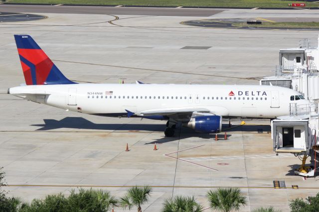 Airbus A320 (N344NW) - Delta Flight 892 (N344NW) sits at the terminal at Tampa International Airport following a flight from Detroit Metro-Wayne County International Airport