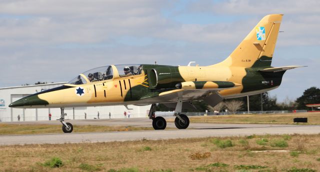 Aero L-39 Albatros (NX711LC) - An Aero Vodochody L-39C Albatros arriving H. L. Sonny Callahan Airport, Fairhope, AL, via Runway 19 during the Classic Jet Aircraft Association's 2020 JetBlast - around noon March 8, 2020.