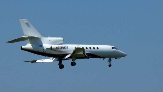 Dassault Falcon 50 (N318GA) - On final is this 1992 Dassault Brequet Falcon 50 in the Summer of 2020.