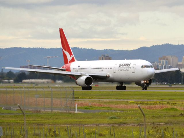 BOEING 767-300 (VH-ZXC) - On taxi-way heading for take off on runway 05, for flight to Sydney. Thursday 12th July 2012.