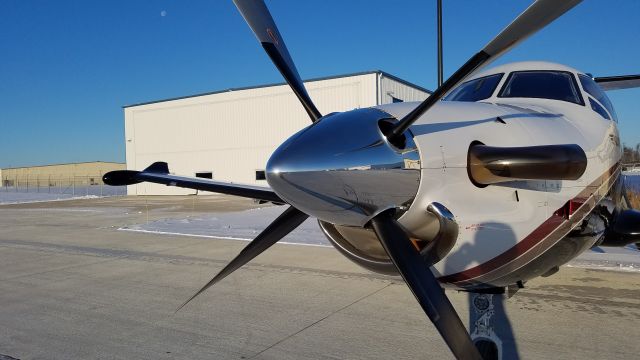 Pilatus PC-12 (N92MZ) - Sunny day + a clean spinner = awesome reflections before the busy period hits on game day in Green Bay.
