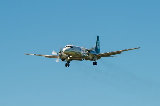 ZK-CIE — - One of our unique and classic Convair C580s from Air Chathams coming into land at Christchurch Airport, but leaving her trail of Allison turbo-prop exhaust trails out the back.