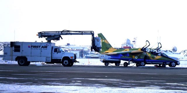 NAF477 — - Nigerian Air Force Alpha Fighter Jet NAF477 getting DeIced in Iqaluit, Nunavut