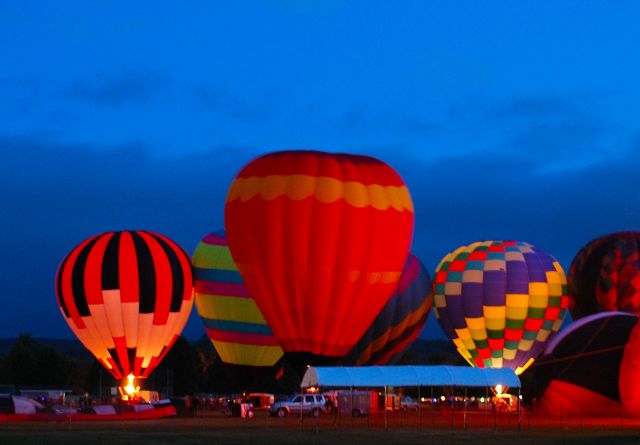 Unknown/Generic Balloon — - Sussex, New Brunswick Sept 7 2012. Annual Balloon Festival "Moon Glow" event.  After dusk, brief blasts of flame light them up from inside.