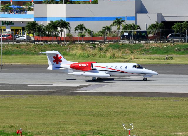 Learjet 35 (N31GJ) - N31GJ medivac departing St Maarten.