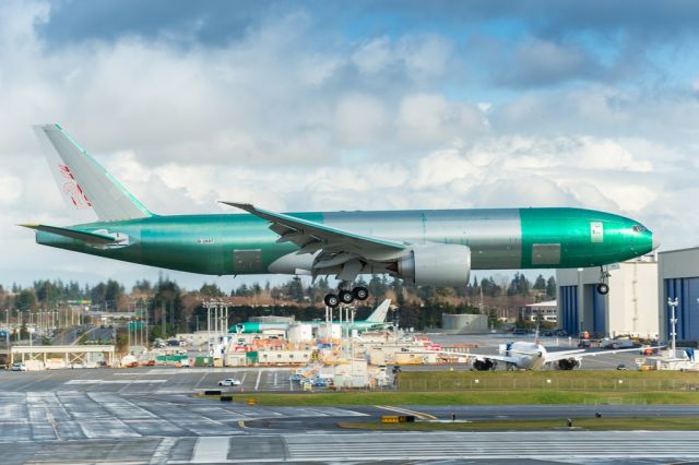 BOEING 777-200LR (B-2097) - An unpainted Boeing 777 Freighter Air China comes back from B1 test flight and landing on 16R