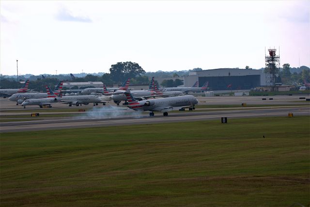 Canadair Regional Jet CRJ-900 (N575NN) - 575NN landing on Rwy 18C at CLT