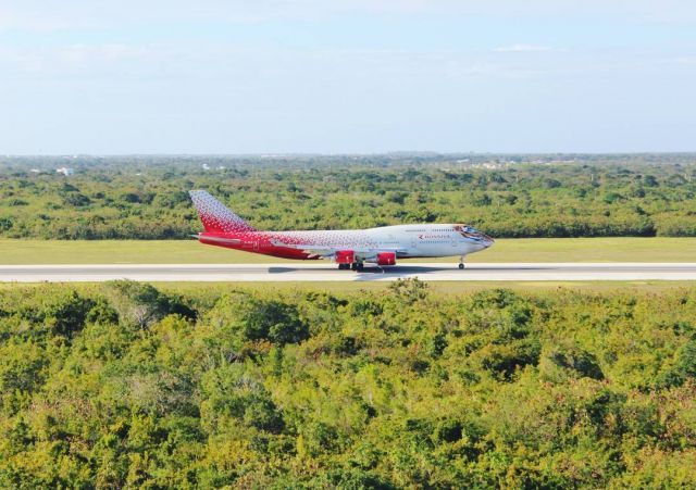 Boeing 747-200 — - Boeing 747-400 from Rossiya Russian Airlines rolling for departure via Runway 08 in Punta Cana. 