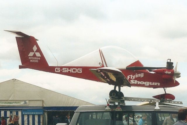 ZENAIR MC-12 Cricri (G-SHOG) - Sitting atop a Mitsubishi Shogun in Jul-98 prior to its drive down the runway.