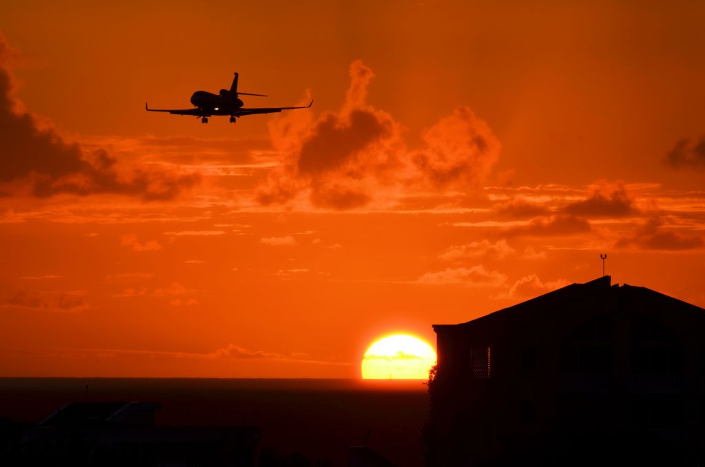 AMERICAN AIRCRAFT Falcon XP (G-CGGN) - Sunset landing, with a peace of Maho.