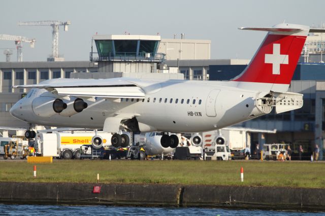 de Havilland Dash 8-400 (HB-IXN) - About to touch down at London City Airport.