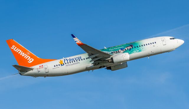 Boeing 737-800 (C-GTVG) - Sunwing 420 climbs off runway 06L bound for Punta Cana, Dominican Republicbr /5/21/18