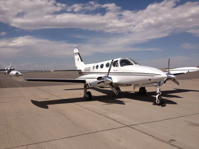 Cessna 340 (N340RF) - At DIA with a flat tire.