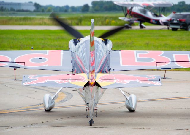 ZIVKO Edge 540 (N423KC) - Kirby Chambliss at the Central Iowa Airshow entertained the audience in his Zivko Edge as part of the Red Bull Air Force.  His performance was awesome and showcased his skills in the aircraft.  Photo taken August 25, 2019 with Nikon D320 at 185mm.