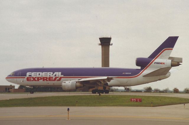 McDonnell Douglas DC-10 (N68054) - Lining up on 23-L. 1989/90 timeframe. Scanned from print.