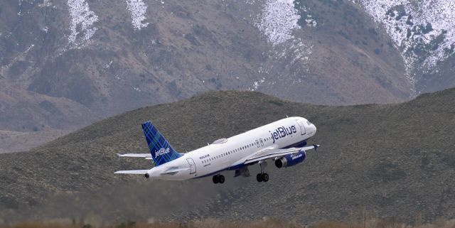 Airbus A320 (N558JB) - N558JB, jetBlue's "Song Sung Blue," on the climb and heading for LAX.