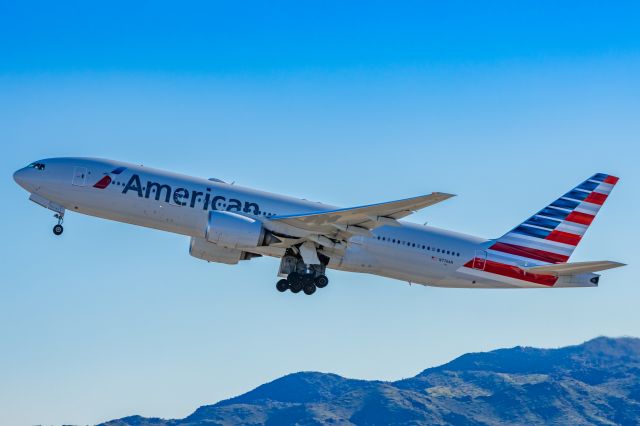 Boeing 777-200 (N776AN) - An American Airlines 777-200 taking off from PHX on 2/9/23 during the Super Bowl rush. Taken with a Canon R7 and Tamron 70-200 G2 lens.