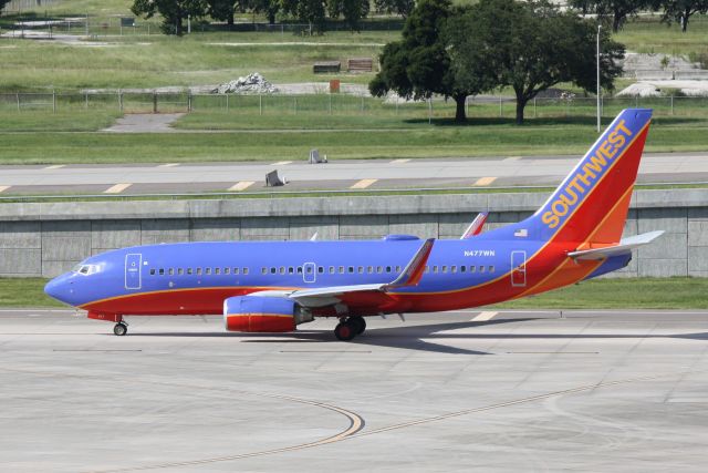 Boeing 737-700 (N477WN) - Southwest Flight 3842 (N477WN) taxis at Tampa International Airport enroute  to Green Airport