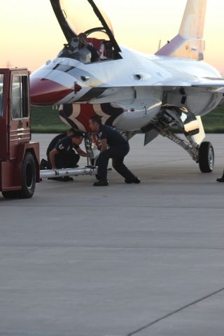 Lockheed F-16 Fighting Falcon — - T-Birds crew making sure Thunderbird 1 is lined up straight with the rest of the group on the West Ramp at Gary Regional Airport