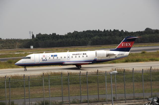 Canadair Regional Jet CRJ-200 (JA04RJ) - Taxi at NRT Airport on 2011/10/9 Gannbarou! Thohoku