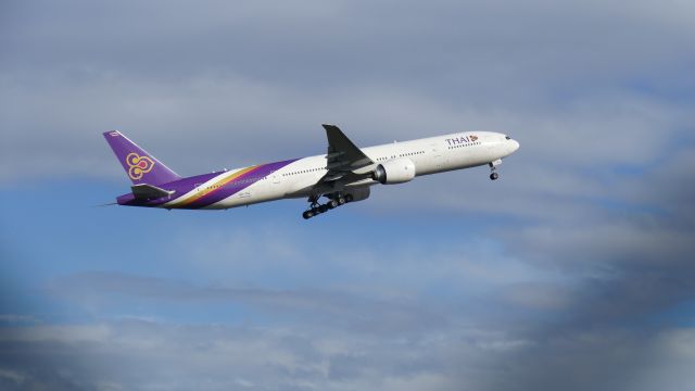 BOEING 777-300ER (HS-TKL) - Landing gear was finally retracted after quite a time after take-off; flight TG971 to Bangkok on 4th Feb 2017.