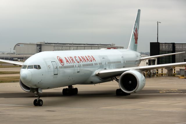 BOEING 777-300ER (C-FIUW) - 10th August, 2024: Red-eye flight AC 860 from Vancouver BC is about to park at London Heathrow's Terminal 2 Gate B43. 