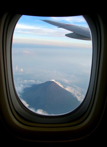 Boeing 777-200 (JA712A) - Mount Fuji as seen from my window seat as we were starting our decent towards Tokyo.