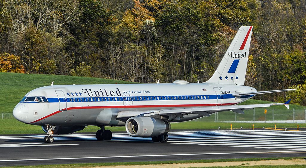 Airbus A320 (N475UA) - Uniteds A320 Friend Ship lined up on a recently redone 28R.