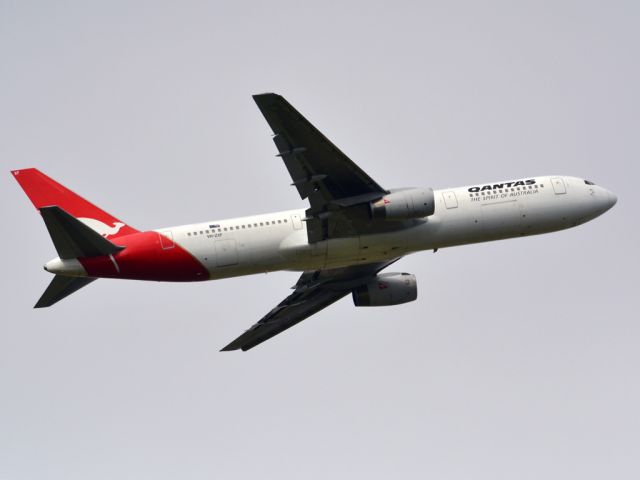 BOEING 767-300 (VH-ZXF) - Getting airborne off runway 23 on a gloomy, cold day. Wednesday, 4th July 2012.