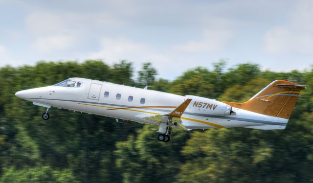 Learjet 55 (N57MV) - Good looking Lear 55 departing SRB. Owned by N57MV Partners, LLC.