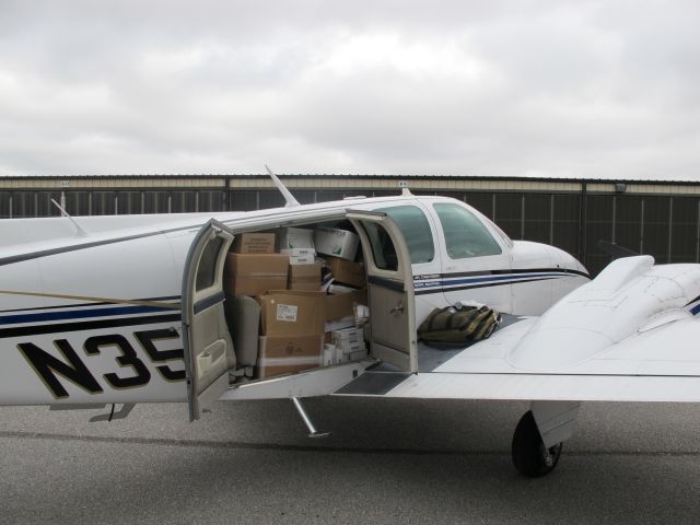 Beechcraft Baron (58) (N359P) - Loaded up for another trip to Haiti.