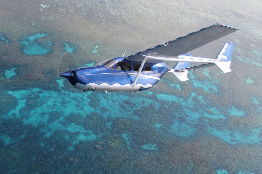 Cessna Super Skymaster (VH-OIQ) - Reef scenic flight over Great Barrier Reef with OutbackOvernight.com