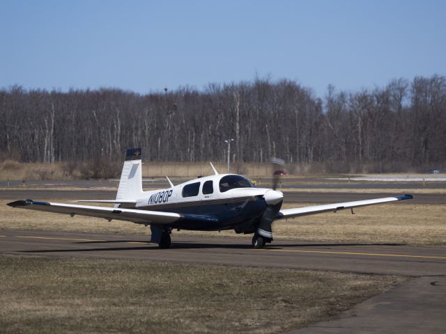 Mooney M-20 (N1080P) - Taxiing out for departure runway 35. A fast aircraft.