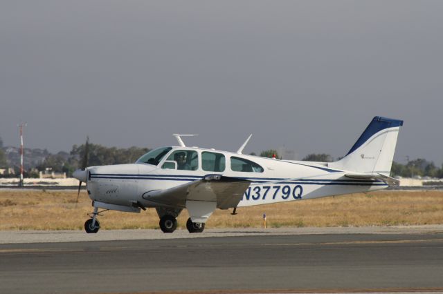 Beechcraft Bonanza (33) (N3779Q) - Taxiing for takeoff at John Wayne Airport, July 17 2018. 