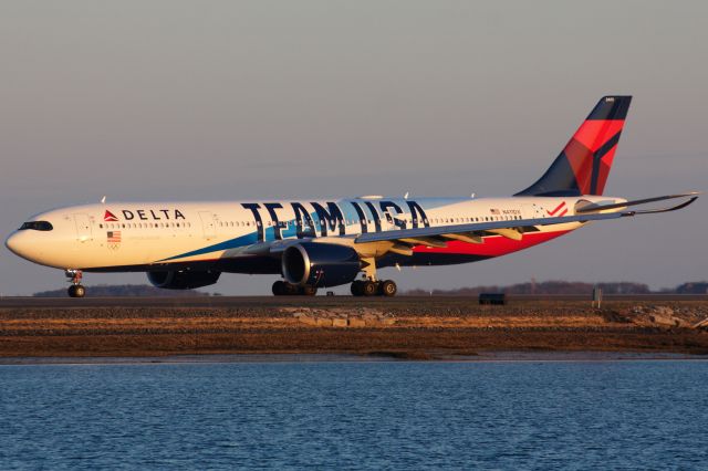 Airbus A330-900 (N411DX) - Delta A339 in special Team USA livery departing BOS for AMS on 4/5/22.