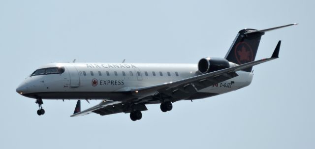 Canadair Regional Jet CRJ-200 (C-GJZZ) - Moments before landing, spring 2019.