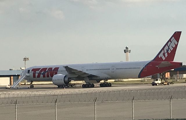 Boeing 777-200 (PT-MUA) - By The Fence at the cargo Area for UPS