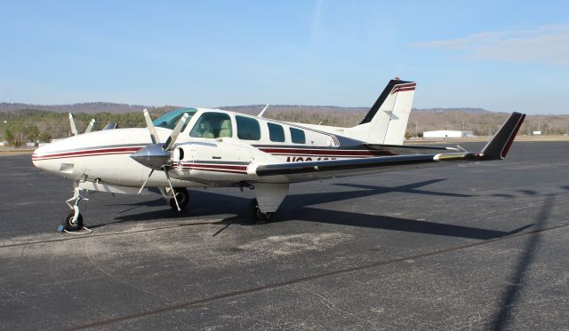 Beechcraft Baron (58) (N6040R) - A Beechcraft BE58 Baron, fitted with MTV-14 four-bladed propellers, on the ramp at Isbell Field Airport, Fort Payne, AL - December 21, 2016.