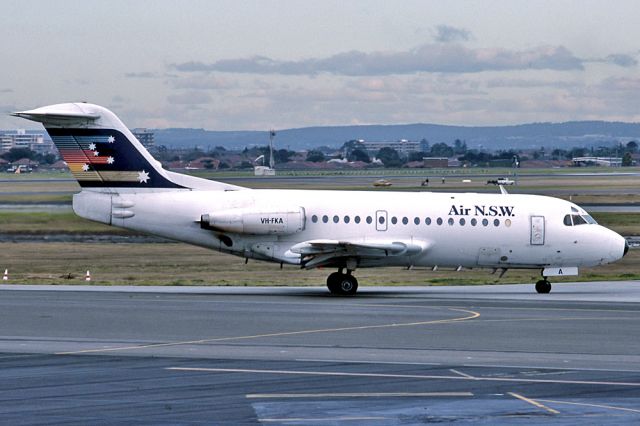 Fokker 100 (VH-FKA) - AIR NSW - FOKKER F-28-1000 FELLOWSHIP - REG : VH-FKA (CN 11345) - KINGSFORD SMITH SYDNEY NSW. AUSTRALIA- -YSSY 26/8/1988 35MM SLIDE SCANNED WITH A EPSON PERFECTION V700 FLATBED SCANNER.SCANNED AT 6400 DPI.