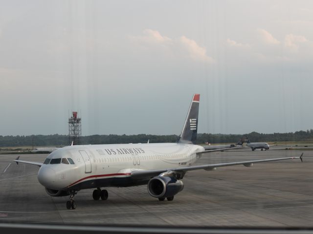 Airbus A320 (N658AW) - Turning to Gate at CLT on 4/27/12