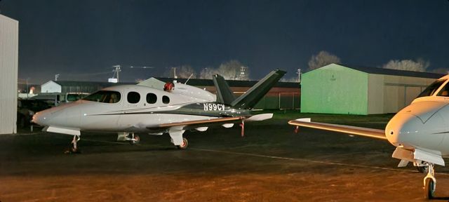 Cirrus Vision SF50 (N99CV) - Two Cirrus vision jets sitting at the ramp in Montgomery County Airpark