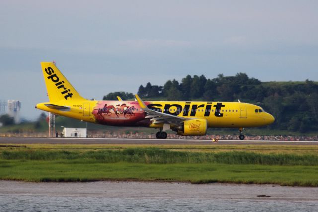 Airbus A320neo (N932NK) - Spirit A320-271N (N932NK) in special 'Spirit Untamed' livery departing Logan early morning on 6/23/21. Plane previously had Country Singer Brett Young special livery.