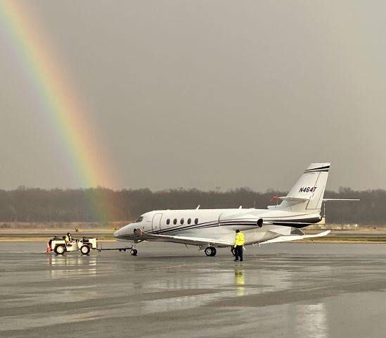 Cessna Citation Sovereign (N464T) - On the ramp at TEB / Meridian FBO during a rain shower.