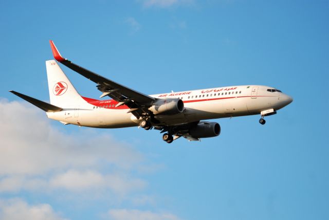 Boeing 737-800 (7T-VKN) - Taken from the theshold of 09L