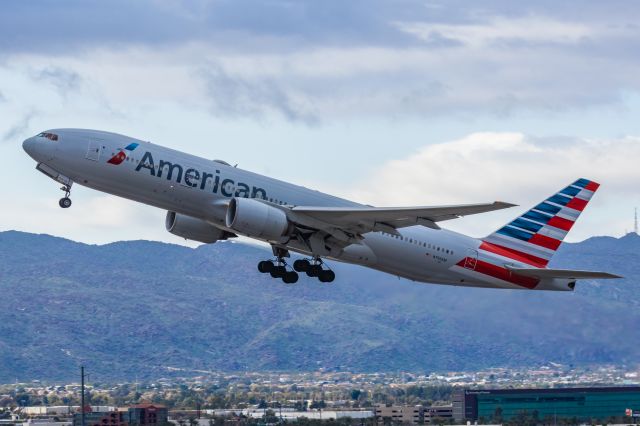Boeing 777-200 (N756AM) - An American Airlines 777-200 taking off from PHX on 2/14/23. Taken with a Canon R7 and Canon EF 100-400 II L lens.